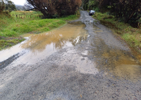 A car driving on a road

Description automatically generated
