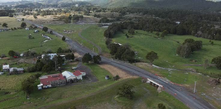 A road leading to a village

Description automatically generated with medium confidence
