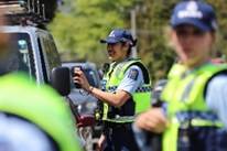 A police officer taking a picture of a car

AI-generated content may be incorrect.