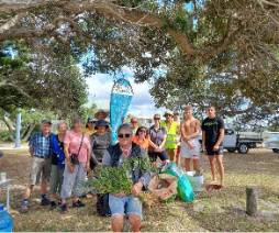 A group of people standing under a tree

AI-generated content may be incorrect.