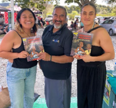 A group of people holding books

AI-generated content may be incorrect.
